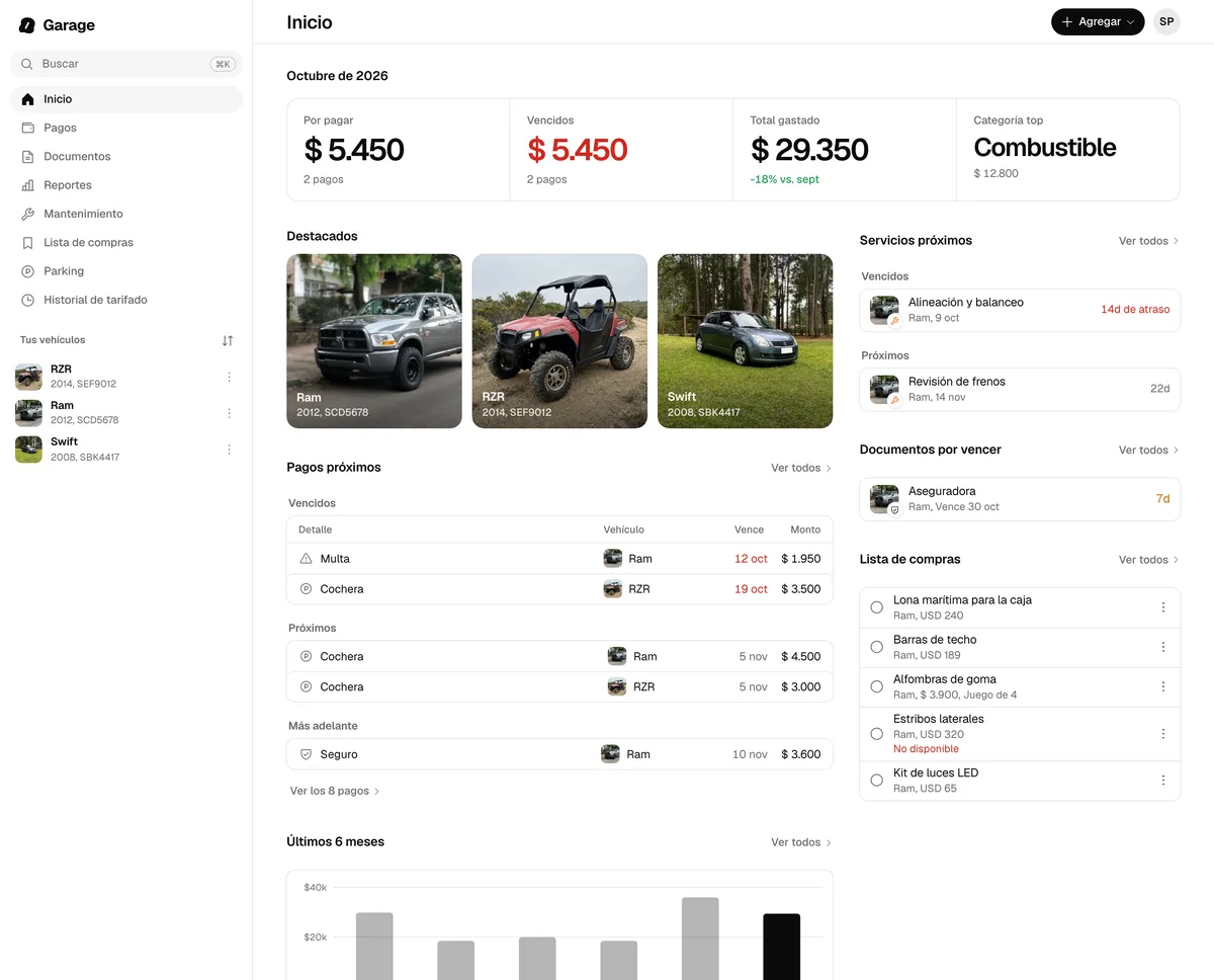 La pantalla de Inicio de GarageApp en la web, en una computadora, con el menú lateral y los vehículos
